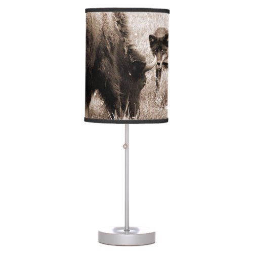 Agressive bison and black wolf table lamp