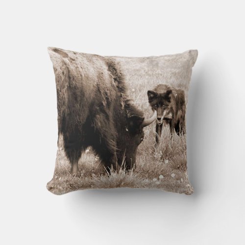 Agressive bison and black wolf throw pillow