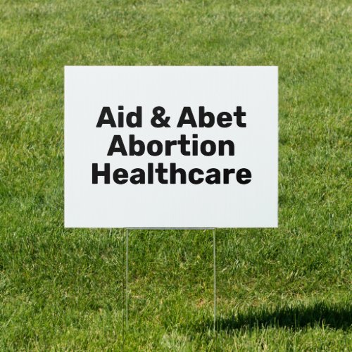 Aid  Abet Abortion Healthcare white and black Sign