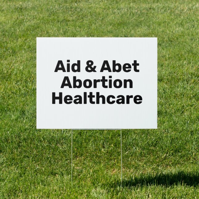 Aid & Abet Abortion Healthcare white and black Sign (Insitu)