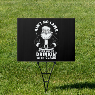 Aint No Laws When Youre Drinking With Claus Christ Sign