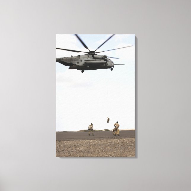 Air Force pararescuemen conduct a combat insert Canvas Print (Front)