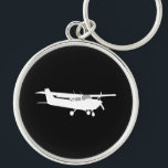 Aircraft Classic Cessna Silhouette Flying on Black Keychain<br><div class="desc">Aircraft Classic Cessna Silhouette Flying on black for any aviation enthusiast, customize this with text and your choice of background color. Easily add text to this design in one step. Just click on the "Customize It!" button to reveal the text editor from which you can choose any font style and...</div>