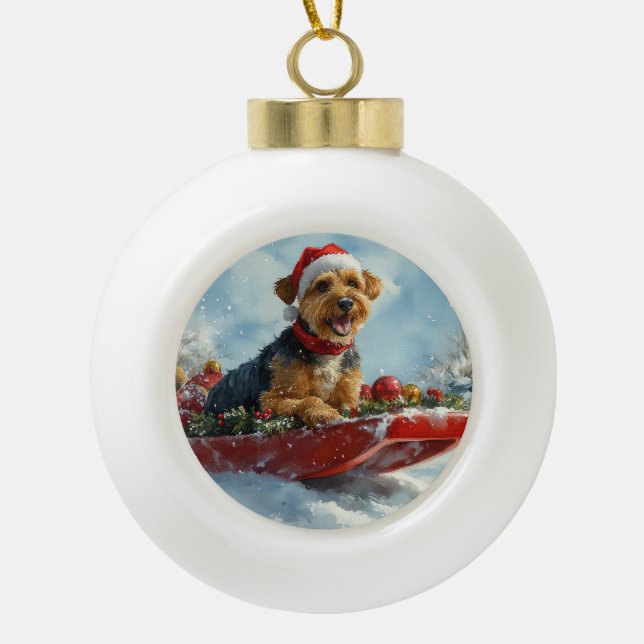 Airedale Dog in Sledge Let it Snow Christmas Ceramic Ball Christmas Ornament (Front)