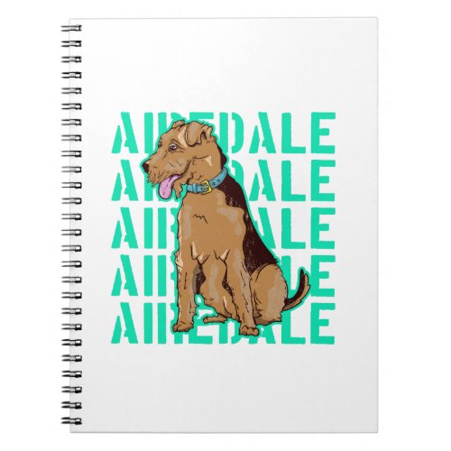 Airedale terrier sitting down notebook