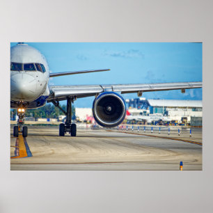 Airliner taxiing toward departure poster
