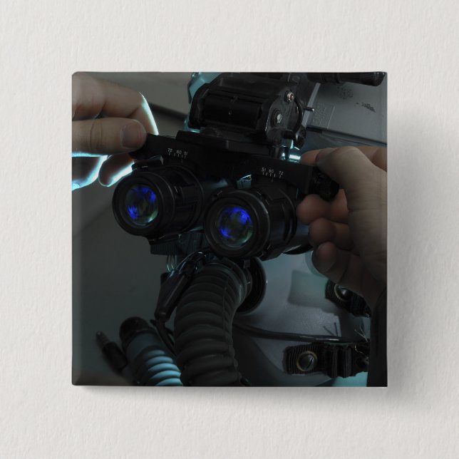 Airman adjusts the eyespan button (Front)