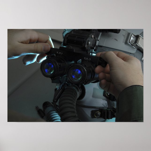 Airman adjusts the eyespan poster (Front)