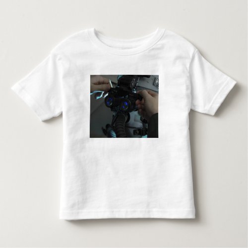 Airman adjusts the eyespan toddler t_shirt