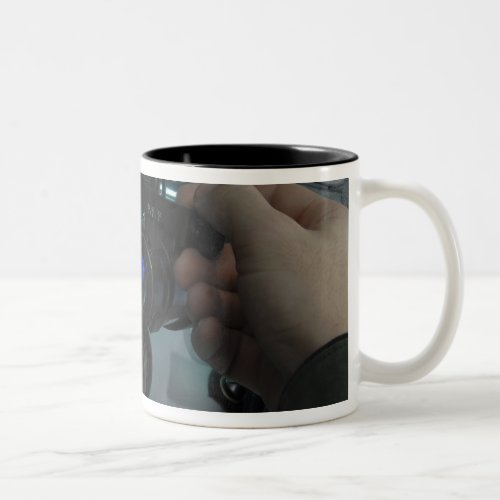 Airman adjusts the eyespan Two_Tone coffee mug