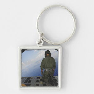 Airman observes the waters of the Gulf of Mexic Keychain