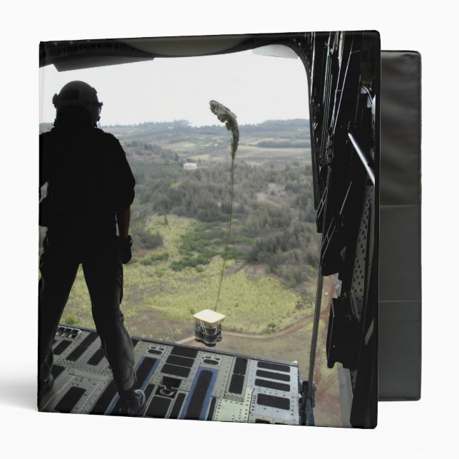 Airman watches a practice bundle fall binder (Front/Inside)