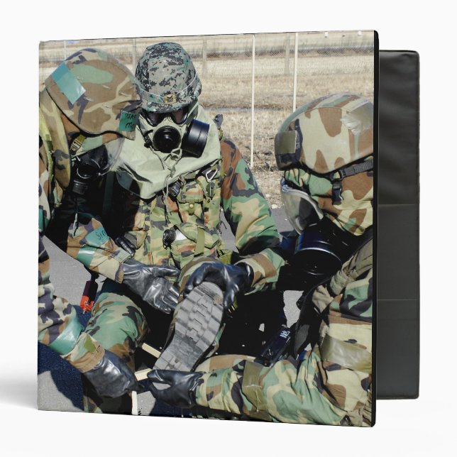 Airmen assist a Republic of Korea Army soldier Binder (Front/Inside)