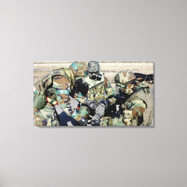 Airmen assist a Republic of Korea Army soldier Canvas Print (Front)