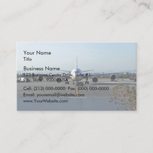 Airplane at airport with blue sky in background business card templates