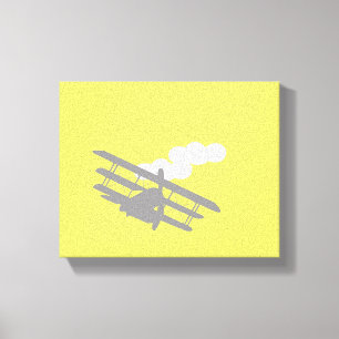 Airplane on plain yellow background. canvas print