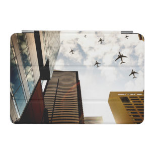 Airplanes flying over buildings iPad mini cover