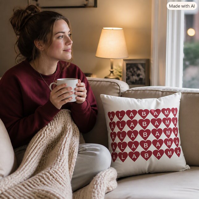 Alabama Crimson Red Hearts Grid Pattern Throw Pillow (A throw pillow with a red heart pattern that spells Alabama.)