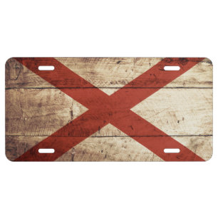 Alabama State Flag on Old Wood Grain License Plate