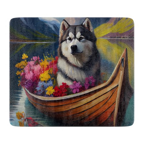 Alaskan Malamute Dog on Paddle A Scenic Adventure Cutting Board