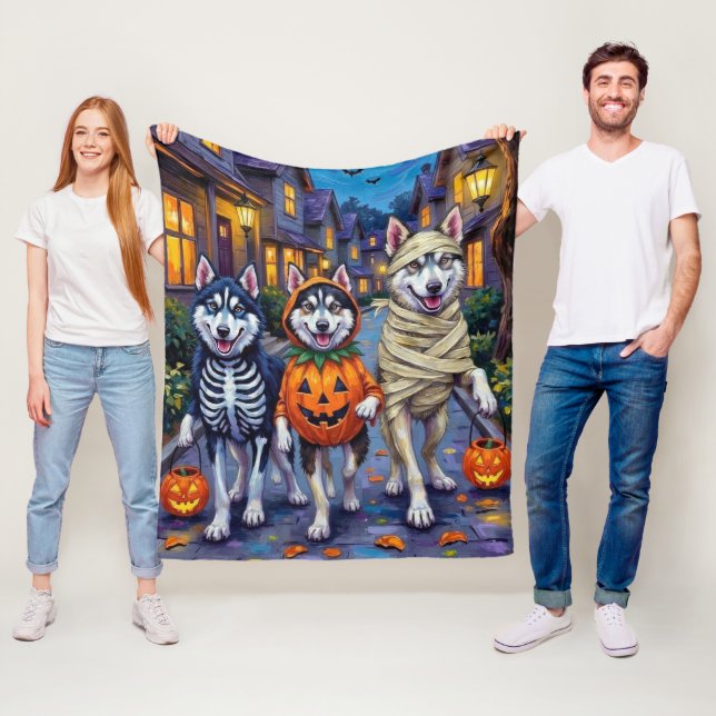 Alaskan Malamute Dogs Trick-or-Treating Halloween  Fleece Blanket (In Situ)