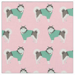 alaskan malamute in scrubs in pink fabric