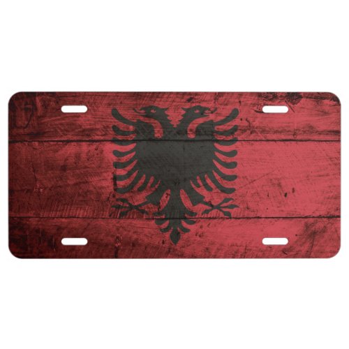 Albania Flag on Old Wood Grain License Plate