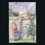 Alice Meets Humpty Dumpty Towel<br><div class="desc">“Humpty Dumpty sat on a wall. Humpty Dumpty had a great fall….” Remember? Here is a 16” x 24” kitchen towel with a vintage image of Alice meeting Humpty Dumpty, who appeared in Lewis Carroll's “Through the Looking-Glass” (1872). See the entire Wonderland Kitchen Towel collection in the FOOD/BEV | Linens...</div>