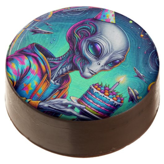 Alien holding Birthday Cake Chocolate Covered Oreo (Angled)