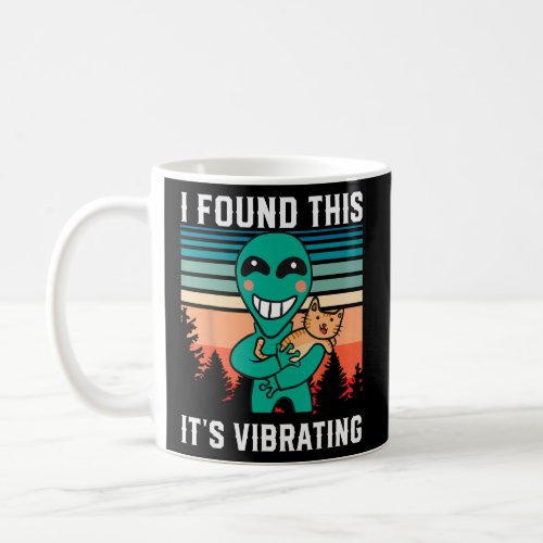 Alien holding purring cat  I Found This  It s Vibr Coffee Mug