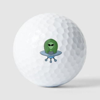 Alien in his little spaceship golf balls