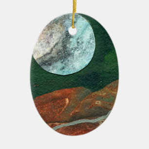 Alien moon in a green night sky ceramic ornament