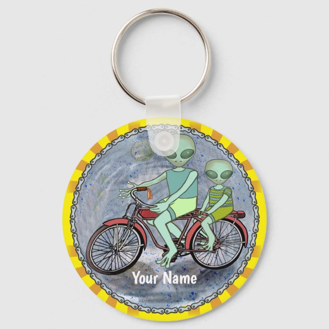 Alien Riding Bike keychain (Front)