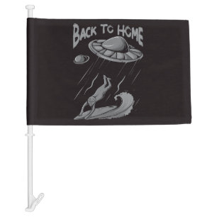 alien ufo surfing illustration with back to home car flag