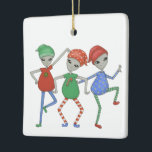 Aliens rock for Christmas #2  Ceramic Ornament<br><div class="desc">Believe in the magic of Christmas with these fun,  dancing aliens ornament. Personalize on the back and it doubles as a gift tag to hang on the tree afterwards. A special gift forever!</div>