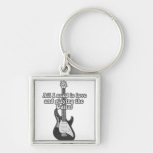 All i need is love and playing the guitar. B & W Keychain