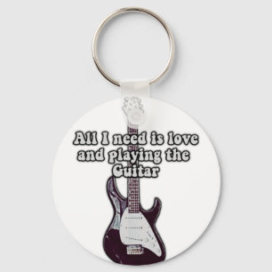 All i need is love and playing the guitar. vintage keychain