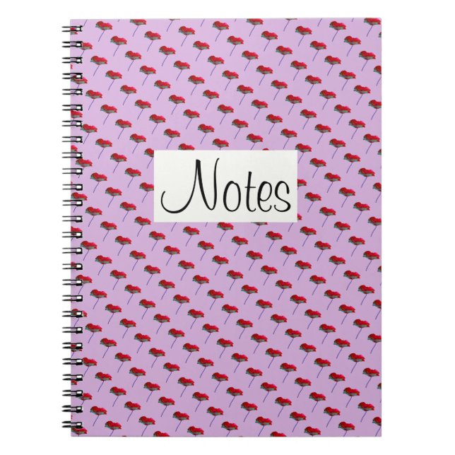 All-over poppy flower decoration on pink notebook (Front)