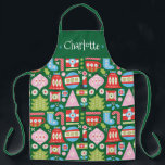 All-Over Print Apron<br><div class="desc">A stylish and modern Christmas apron pattern with retro-inspired geometric illustrations of ornaments, stockings, candy canes, gifts, Christmas trees, snowflakes, bells and more. This can be personalized with a name, monogram or your own message. A fun & unique Christmas gift. Colors include; green, red, white, blue and pink.</div>