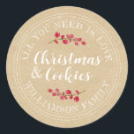All You Need Is Love and Christmas Cookies Kraft Classic Round Sticker<br><div class="desc">Rustic and modern homemade baked goods sticker with the text 'all you need is love & christmas cookies' and your name in white handwritten script calligraphy and modern typography on a kraft paper background with a stylish touch of cranberries sprigs. Simply add your family name and the product name to...</div>
