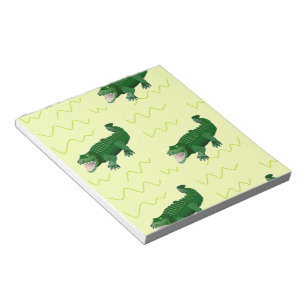 Alligator on yellow notepad
