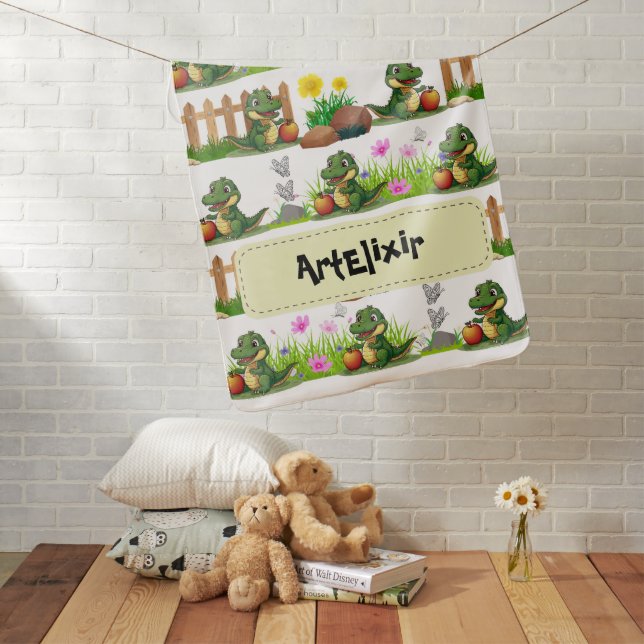 Alligator with an apple in the garden baby blanket (In Situ)