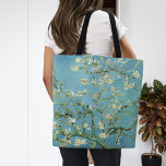Almond Blossoms | Vincent Van Gogh Tote Bag<br><div class="desc">Almond Blossoms (1890) by Dutch artist Vincent Van Gogh. Original artwork is an oil on canvas from a group of paintings made by Van Gogh in southern France of blossoming almond trees. The paintings were influenced by Impressionism, Divisionism, and Japanese woodcuts. Use the design tools to add custom text or...</div>