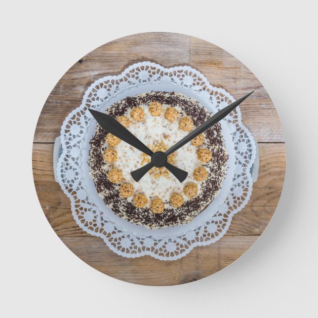 Almond nut cake on rustic wood round clock (Front)