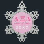 Alpha Xi Delta Pink Letters Snowflake Pewter Christmas Ornament<br><div class="desc">Check out these official Alpha Xi Delta designs! Personalize your own Greek merchandise on Zazzle.com! Click the Customize button to insert your own name, class year, or club to make a unique product. Try adding text using various fonts & view a preview of your design! Zazzle's easy to customize products...</div>