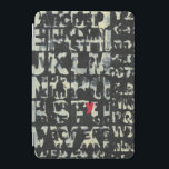 Alphabet Painting by Norman Wyatt iPad Mini Cover<br><div class="desc">If you love taking vision exams then this painting is for you! The letter of the english alphabet are imposed over each other,  almost obscuring them in this painting by Norman Wyatt. The letter Y stands out thanks to its pink coloration.</div>