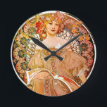 Alphonse Mucha Dreaming (Reverie) Round Clock<br><div class="desc">Alphonse Mucha  Dreaming (Reverie) c1897 is a beautiful example of the Art Nouveau Genre which he is regarded as starting.

For a full line of Art Deco and Art Nouveau Reproductions visit https://rolandosgiftshop.com/alphonse-mucha-reproductions/</div>