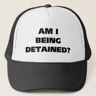 Am I Being Detained Trucker Hat