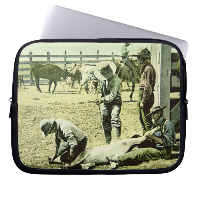 American cowboys branding a calf, c.1900 (photo) laptop sleeve (Front)