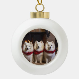 American Eskimo by the Fireplace Christmas Ceramic Ball Christmas Ornament
